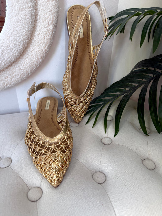 Zapato destalonado dorado