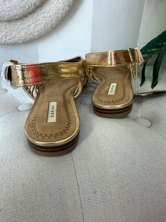 Zapato destalonado dorado